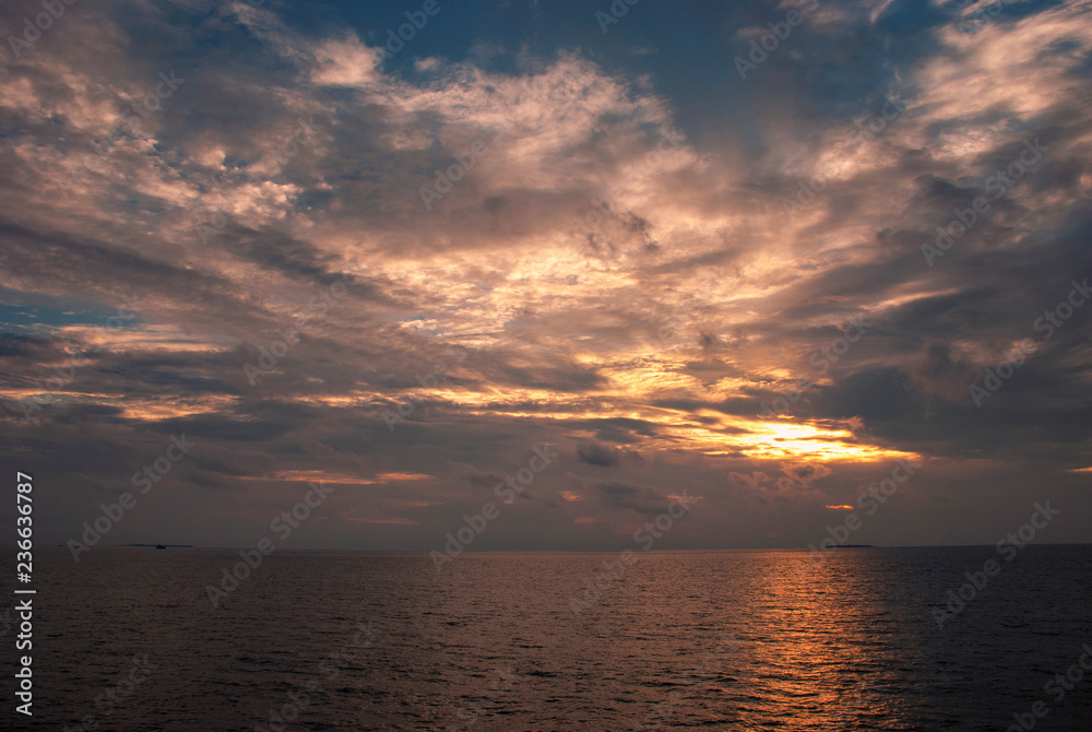 Sunset over the stunning islands of the Maldives in the Indian Ocean
