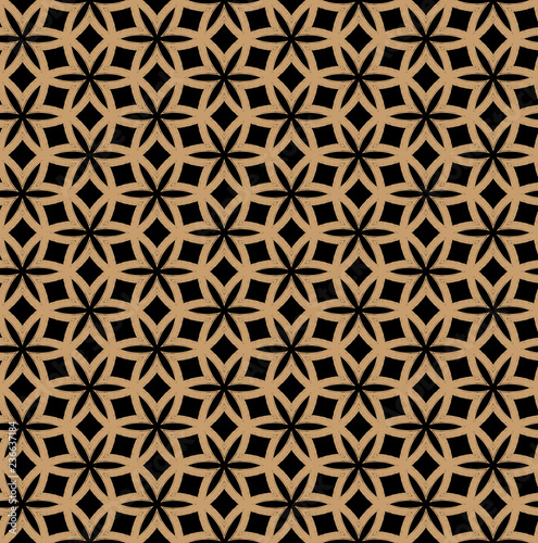 Seamless abstract floral pattern for fabric or wrapping paper in pink and violet shades on a dark purple background.