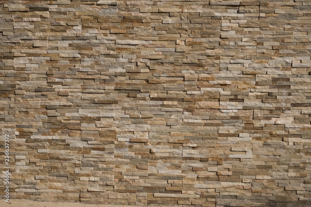 Stone Wall background from modern building contruction facade Stone Wall background from modern building contruction facade