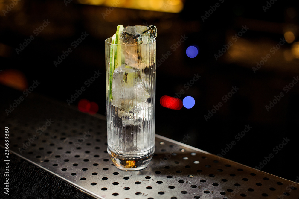 Fresh alcoholic drink with slices of cucumber Fresh alcoholic drink with slices of cucumber
