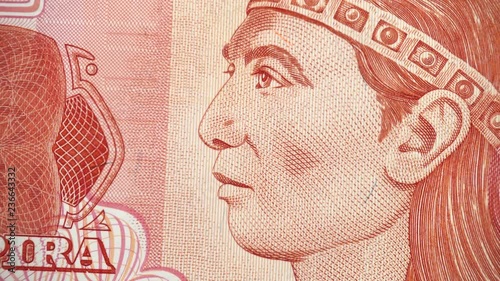 Lempira face on Honduras currency 1 lempira (2010) banknote rotating, Honduran money close up. 4K UHD video footage photo