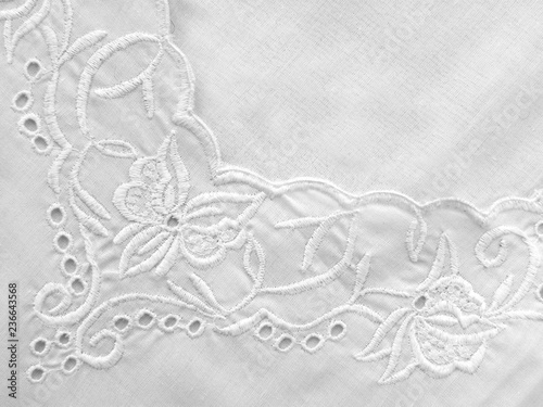 embroidered pattern on white fabric