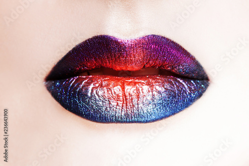 Delightful lip makeup, multi-colored transitions. Beautiful women's lips with bright lipstick, bright stylish makeup