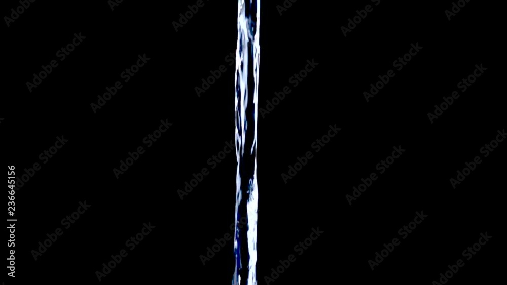 Water jet in slow motion on black background