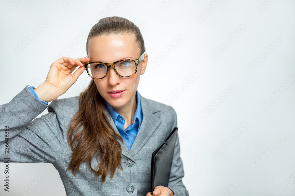 Business girl in suit and glasses with documents Business girl in suit and glasses with documents
