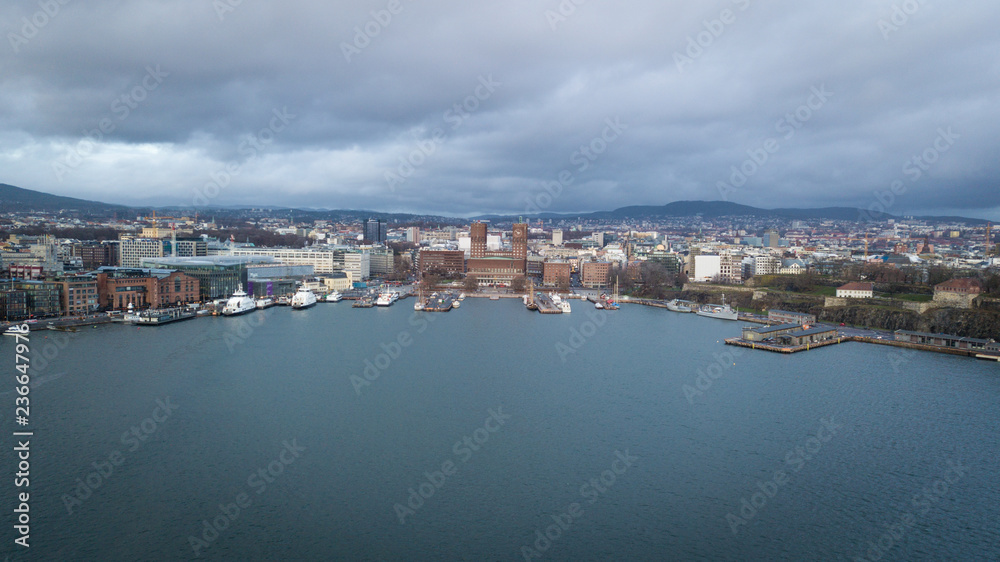 Aerial drone photo over Aker Brygge and City Hall in Oslo, Norway