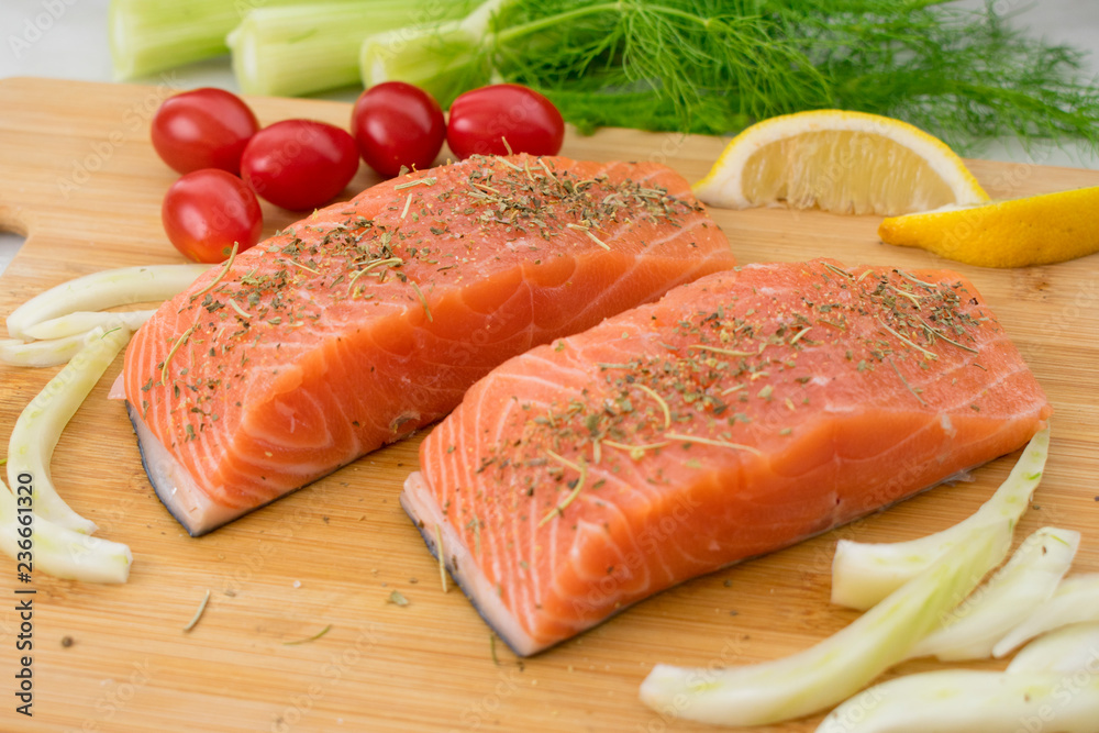 Salmon and Vegetables on a Cutting Board