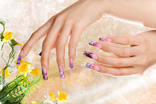 a woman's nail, designed with nail art