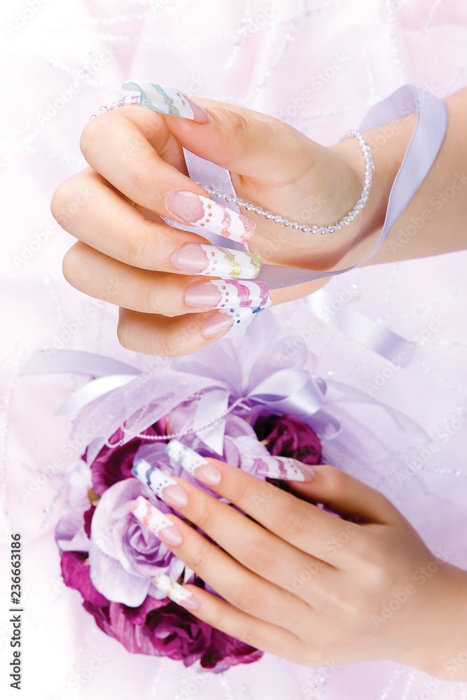 Fototapeta premium a woman's nail, designed with nail art