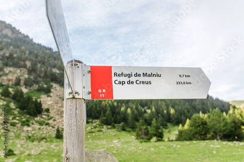 PUIGCERDA, SPAIN - CIRCA JULY 2018: marking sign for GR11 hiking trails and routes in Pyrenees photo