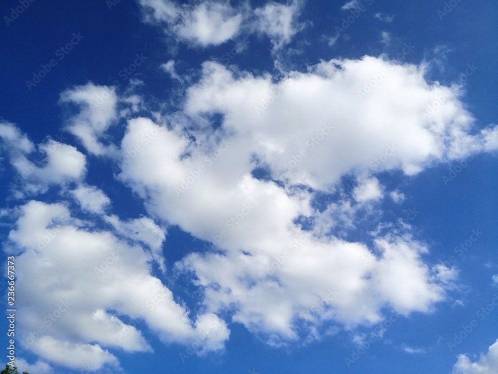 Blue sky with fluffy clouds copy space Blue sky with fluffy clouds copy space
