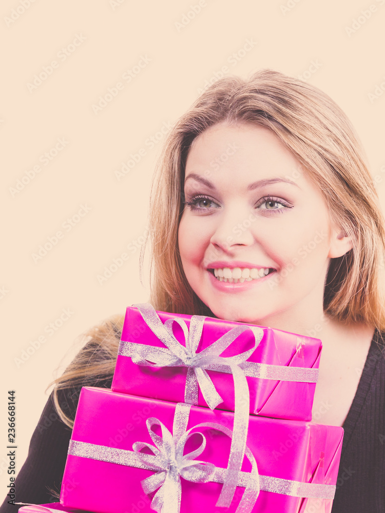 Happy surprised woman with many gifts Happy surprised woman with many gifts