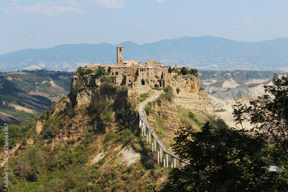 A view of Civita di Bagnoregio, a town in the Province of Viterbo in central Italy, a suburb of the municipality of Bagnoregio, 1 kilometer east from it. It is 120 kilometers north of Rome, Lazio.