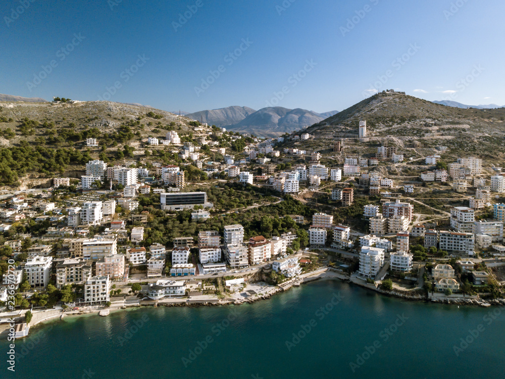 View of Saranda city and lekuresi hill with the castle on top captured with a drone. touristic attraction in Balkan . Ionian sea Mediterranean area. Sarande Albania 