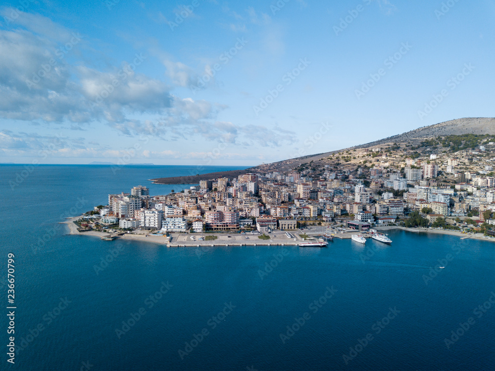 Professional photo taken in Saranda Albania Balkan Europe  showing the port and a part of the city from an aerial view. ionian sea , Mediterranean sea , blue sky blue sea 