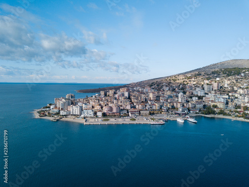 Professional photo taken in Saranda Albania Balkan Europe showing the port and a part of the city from an aerial view. ionian sea , Mediterranean sea , blue sky blue sea 