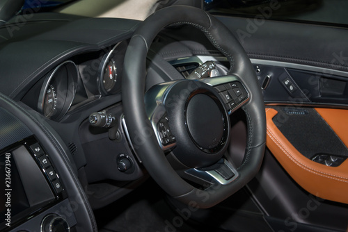 Steering wheel in modern luxury car interior