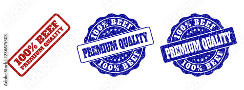 100% BEEF PREMIUM QUALITY grunge stamp seals in red and blue colors. Vector 100% BEEF PREMIUM QUALITY overlays with grunge surface. Graphic elements are rounded rectangles, rosettes,