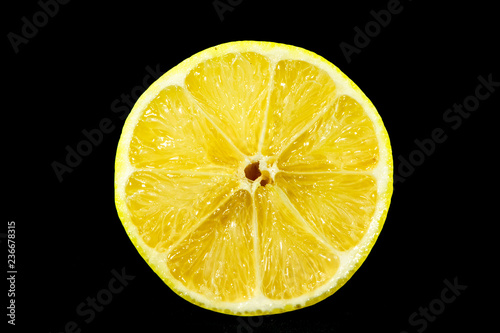 Fresh sliced lemon with black background