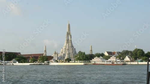 Wat Arun (temple of dawn) at river Chao Phraya in Bangkok, Thailand photo