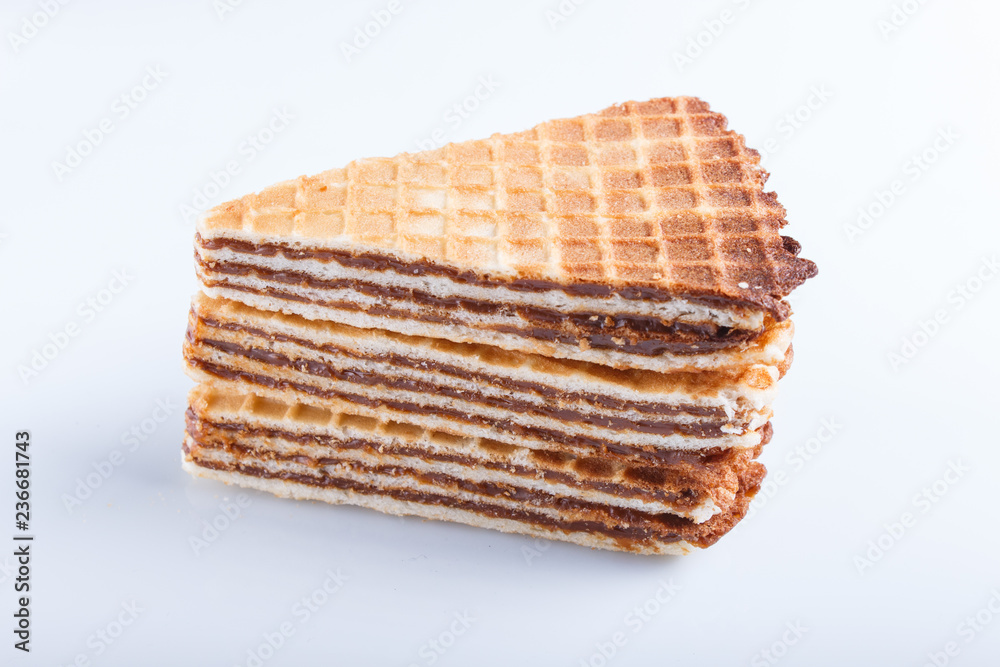 waffle sandwiches with boiled condensed milk isolated on white background. waffle sandwiches with boiled condensed milk isolated on white background.