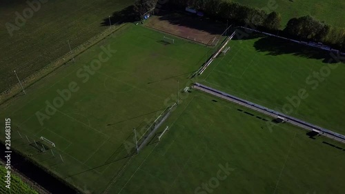 Typical football fields and training ground in the countrysideAerial pan footage photo