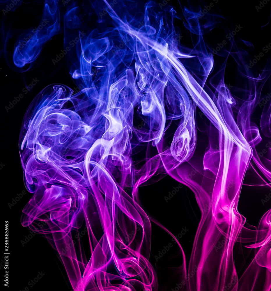 Colored smoke on black background Colored smoke on black background
