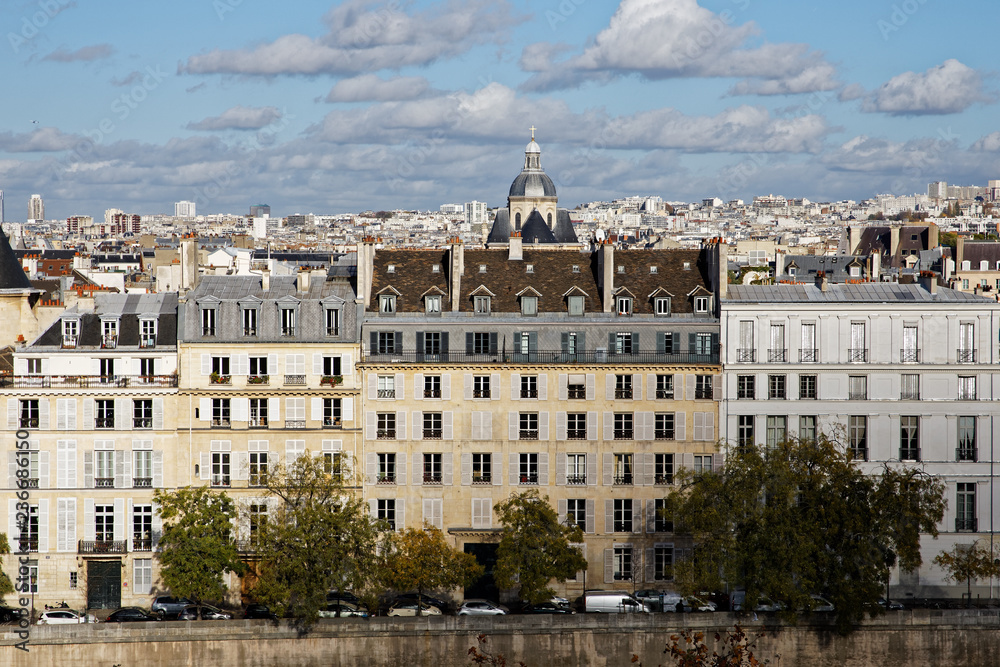 Paris, France - November 13, 2018: Haussmann buildings along the bank of river Seine