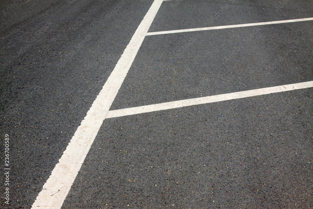 White markings on the asphalt road