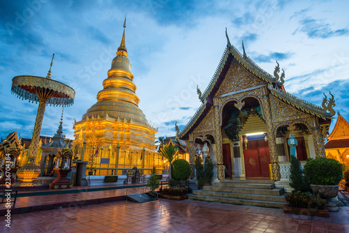 Wat Phra That Hariphunchai the iconic famous temple in Lamphun city, Northern Thailand. View after sunset.