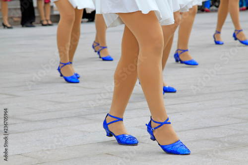 White dress and blue shoes