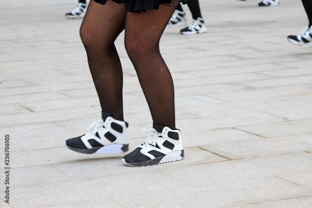 black silk stockings and sneakers Stock Photo | Adobe Stock