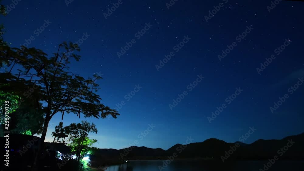 Beautiful Spiral Star Trails over filed with lonely tree. Beautiful night sky. Vortex star trails. Beautiful Spiral Star Trails over filed with lonely tree. Beautiful night sky. Vortex star trails.