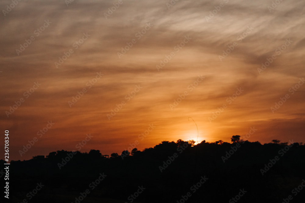 Dramatic sunset over hills