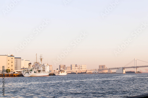 View of Rainbow bridge and boat at sumida river viewpoint in tokyo Japan