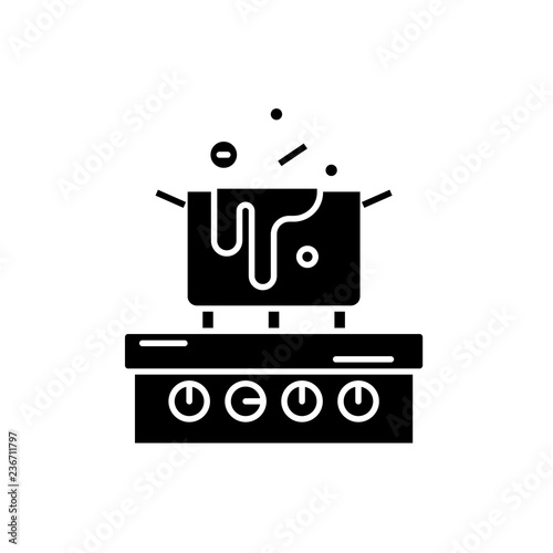 Cooking in the kitchen black icon, concept vector sign on isolated background. Cooking in the kitchen illustration, symbol