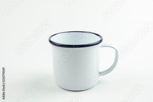 White tin cup.