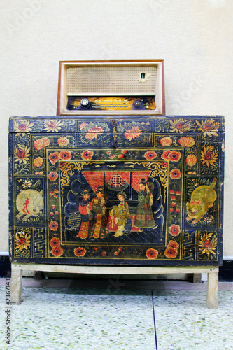 traditional style transistor radio on the cabinet photo