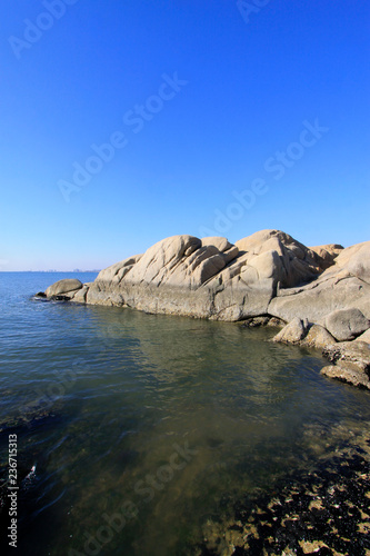 stone and water natural landscape by the sea © zhang yongxin