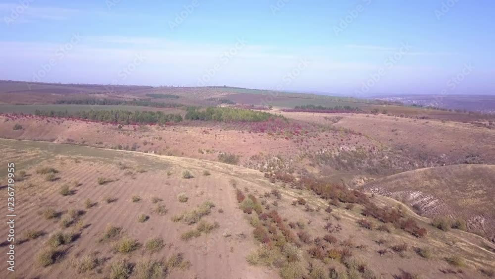 Flight over autumn hill, colorful picturesque unique landscape steppe. Beautiful autumn nature. Flight over autumn hill, colorful picturesque unique landscape steppe. Beautiful autumn nature.
