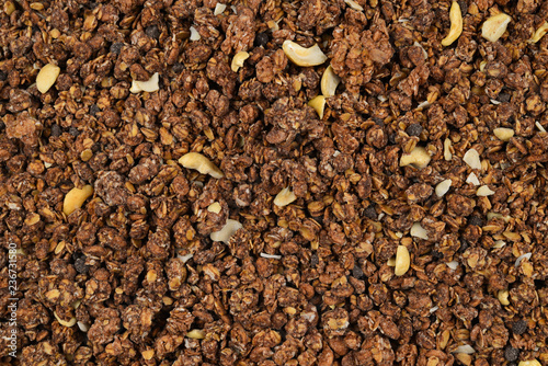 Chocolate granola background. © Nikolay