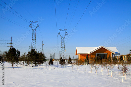 Cabin and pylon in the snow