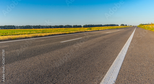 Morning panoramic landscape with empty high-way Dnipro-Kharkiv in central Ukraine