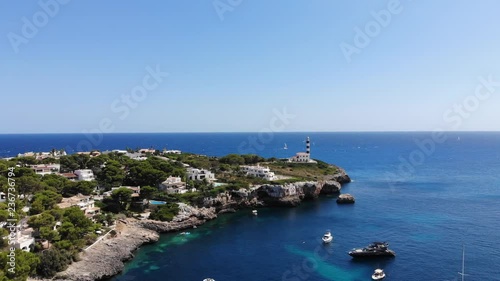 Flight over the bay of Portocolom, village Portocolom, Felanix region, Punta des Jonc and Bay of Cala Marcal, Mallorca, Balearic Islands, Spain photo