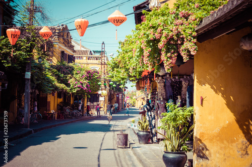 Fototapeta Naklejka Na Ścianę i Meble -  Hoian Ancient town houses. Colourful buildings with festive silk lanterns. UNESCO heritage site. Vietnam.