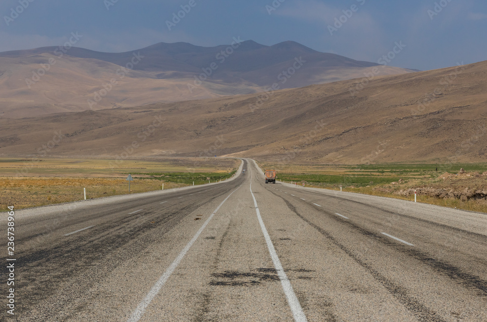 Dogubeyazit, Turkey - on the high plain between Ararat, Iraq and Iran, an amazing display of nature and colors, and roads that seem to lead to nowhere Dogubeyazit, Turkey - on the high plain between Ararat, Iraq and Iran, an amazing display of nature and colors, and roads that seem to lead to nowhere