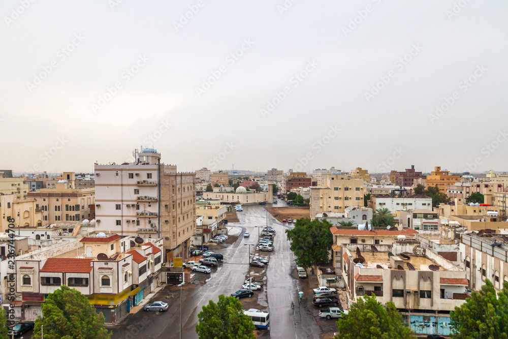 Scenery high view of jeddah city and Black sea with cloudy sky before rain in Saudi Arabia.