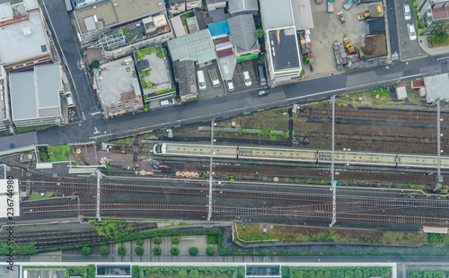 Aerial view of Tokyo cityscape from high above. Railroad tracks from above in city.