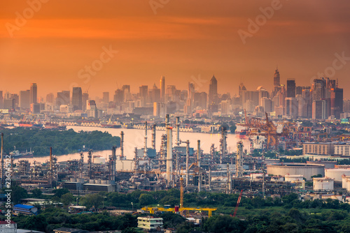 Landscape of Oil Refinery Plant and Manufacturing Petrochemical at Twilight Sunset Scenic View Industry of Power Energy and Chemical Petroleum Product Factory. Cityscape Scenery and Industrial Area