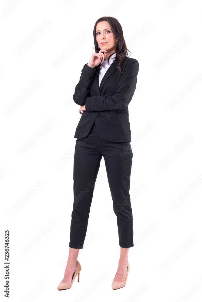 Thoughtful successful business woman looking up having idea. Full body isolated on white background. Thoughtful successful business woman looking up having idea. Full body isolated on white background.